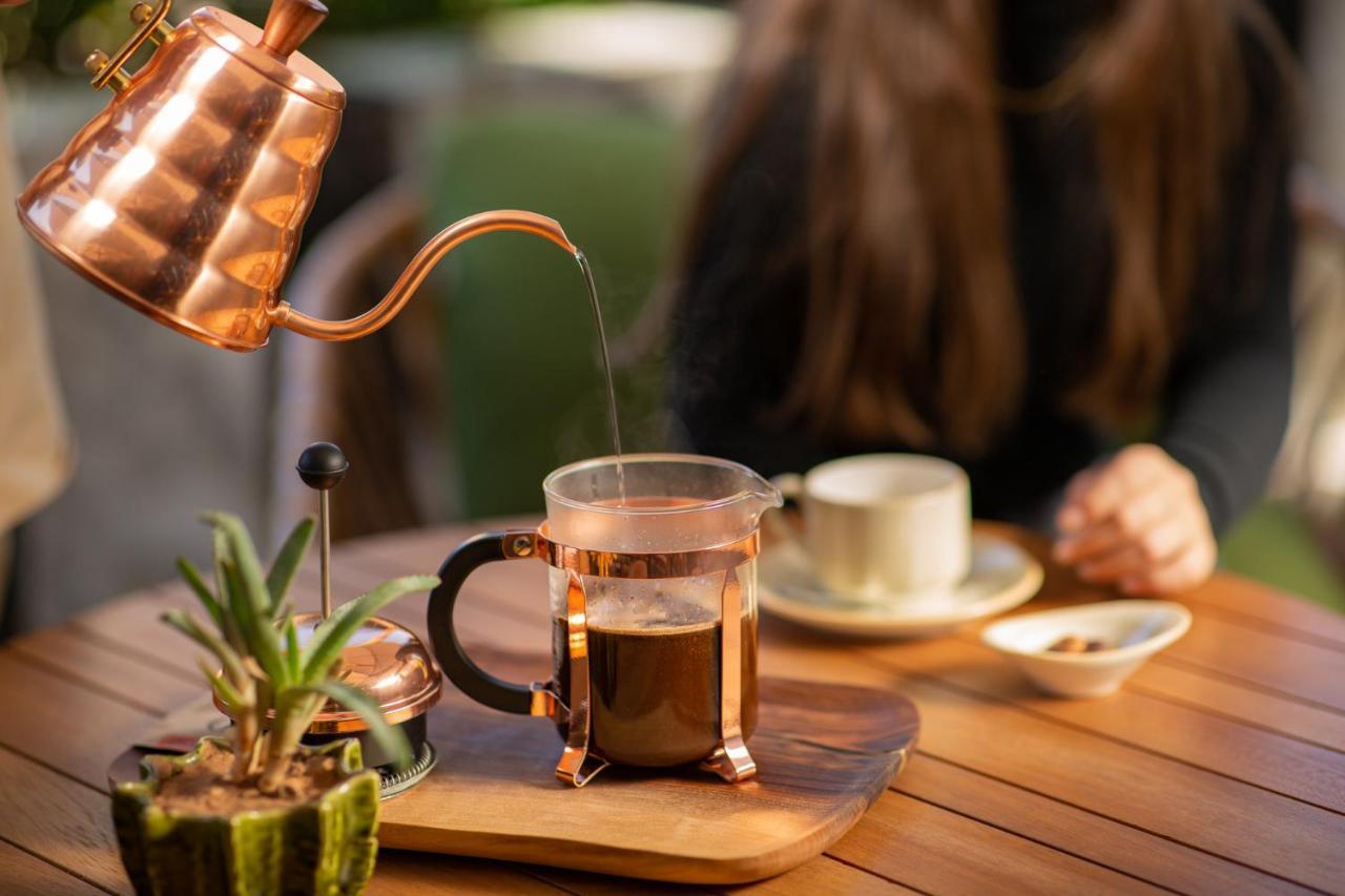 Hotel Jadali & Spa Марракеш Екстер'єр фото A copper kettle and a glass cup